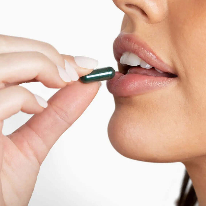 Deodorizing Supplement for Complete Body Care being taken by a woman for full-body freshness.