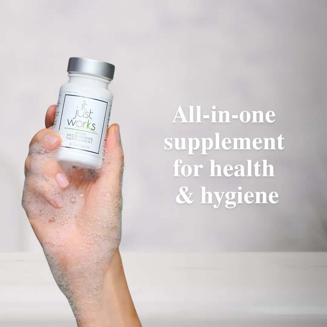 Deodorizing Supplement for Complete Body Care bottle in a soapy hand for body freshness and hygiene.